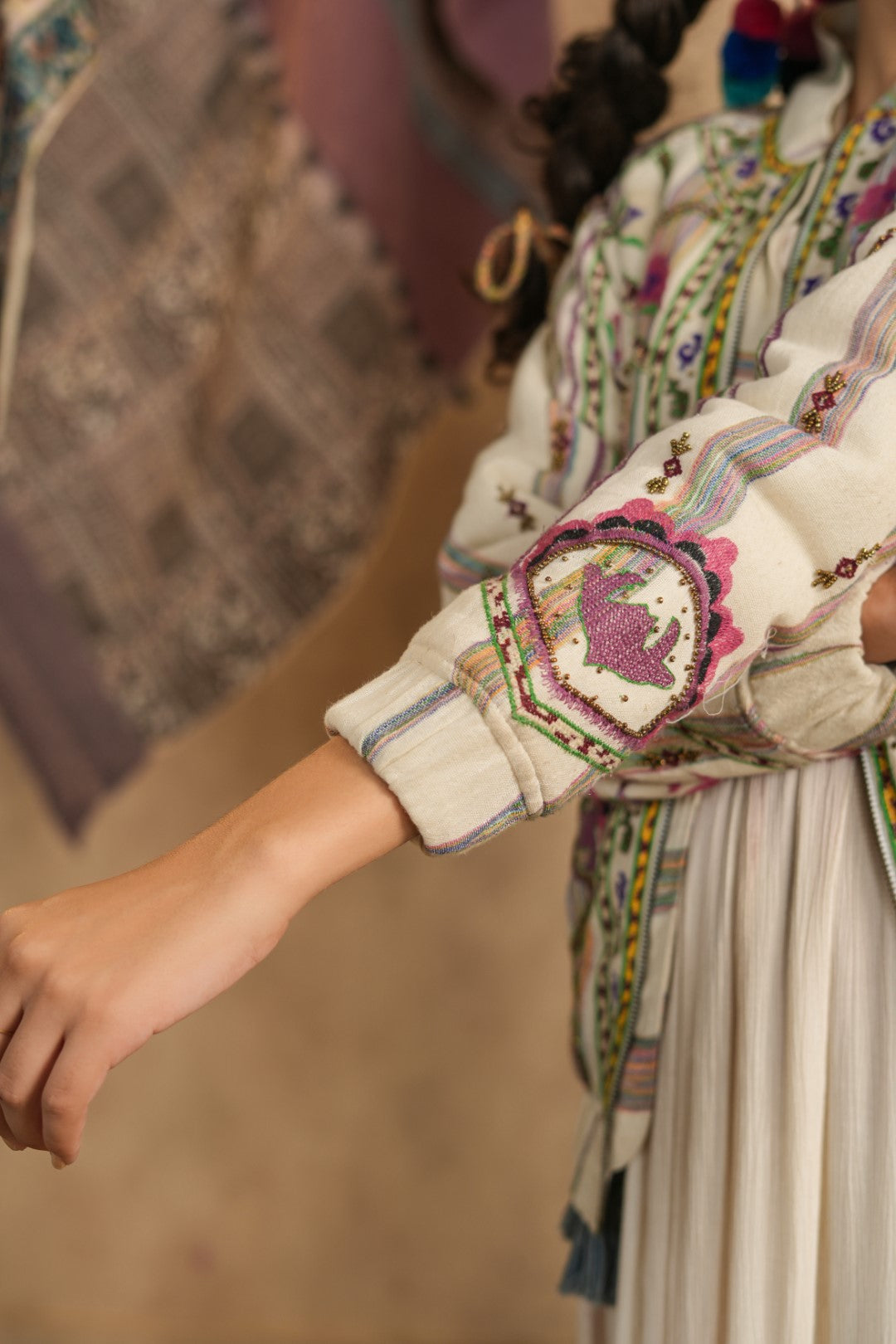 Cream Hand-Embroidered Bohemian Jacket – Multi-Color Threadwork, Tassel Detail, Relaxed Fit