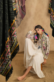 Cream Hand-Embroidered Bohemian Jacket – Multi-Color Threadwork, Tassel Detail, Relaxed Fit