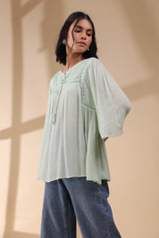 Women Rayon Crepe Green Mirror Work Embroidered Peplum Top