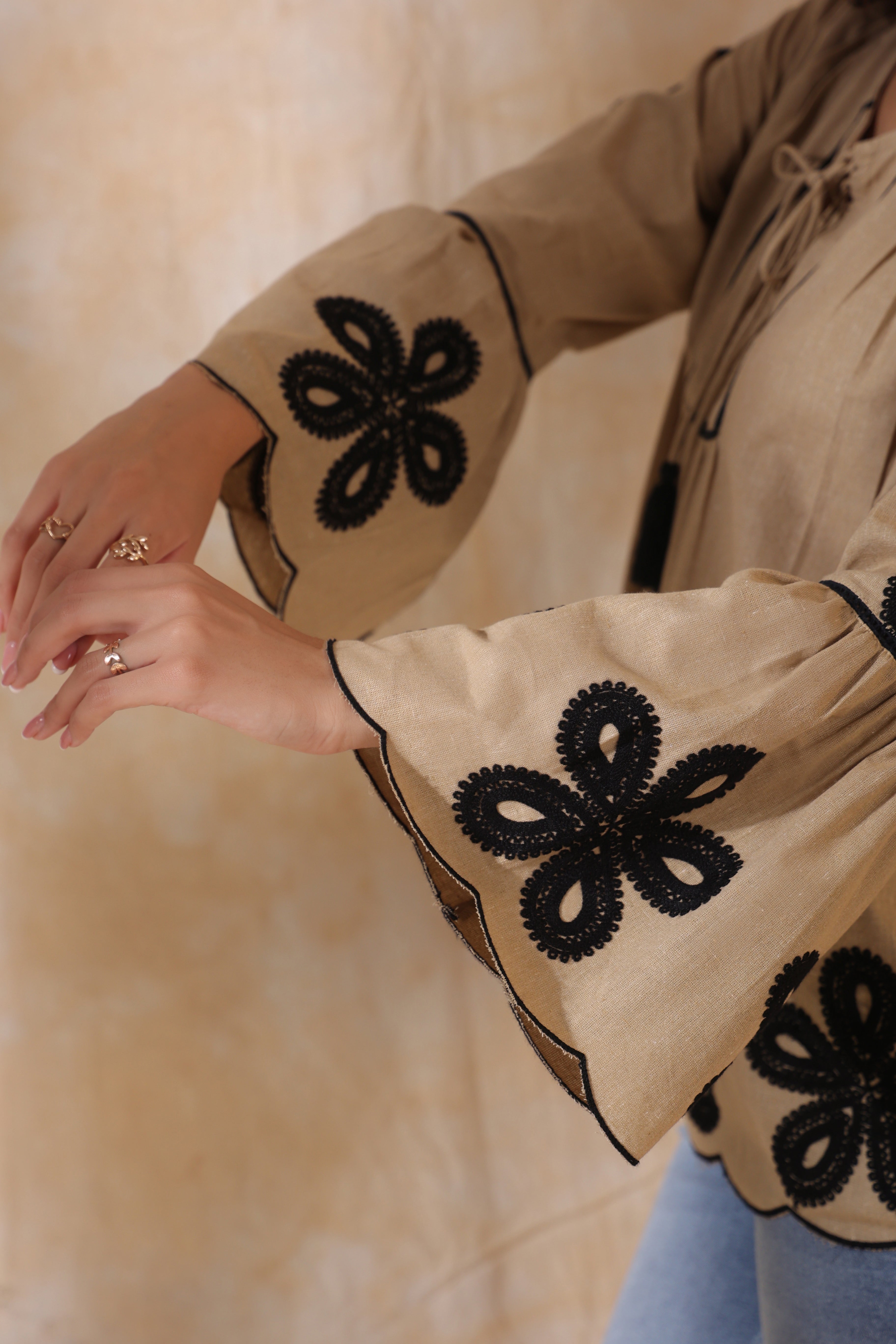 Women Khaki Cotton Flex Black Embroidered Top With Dori & Tassel