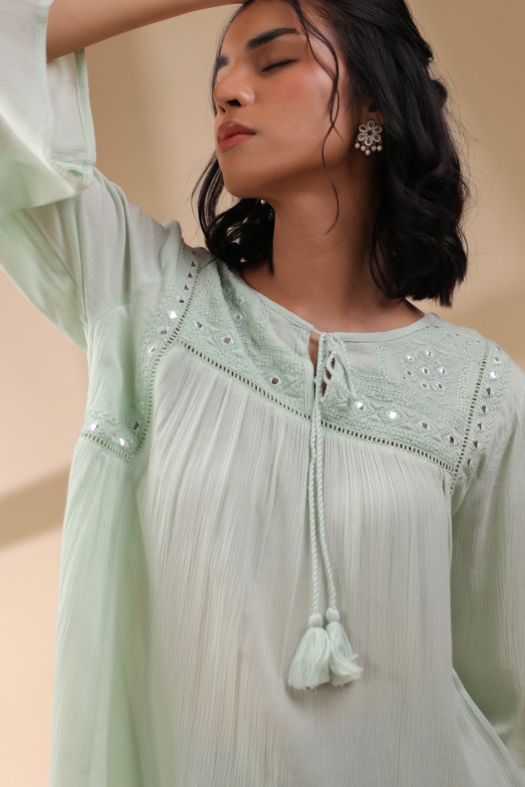 Women Rayon Crepe Green Mirror Work Embroidered Peplum Top - Nyaro